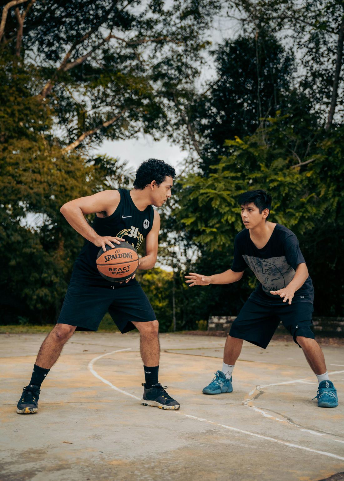 Two players in a basketball one-on-one
